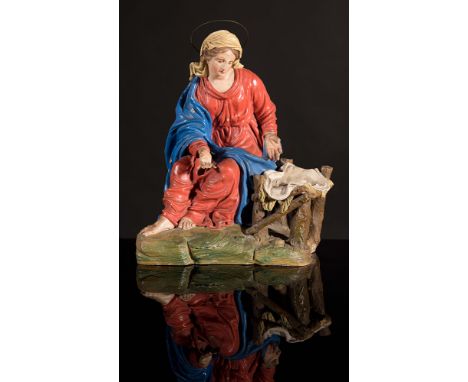 Bolognese shaper, 19th Century, 'Madonna'. Polychrome terracotta crib figure, mark of the Manifacture on the back PL, H cm 34