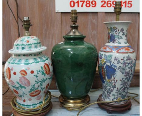 Three late 29th century table lamps of Oriental design, includes a green lamp with malachite glaze Condition: coloured balust