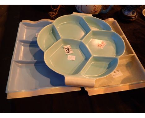 Three Poole ceramic dishes 