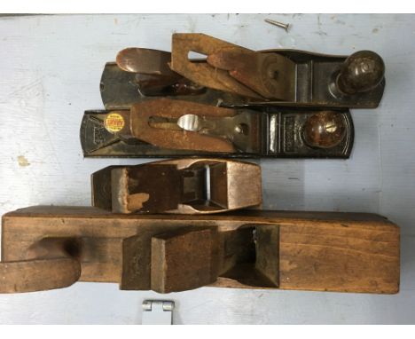 Three homemade toolchests containing a collection of antique and modern woodworking tools including planes, saws etc