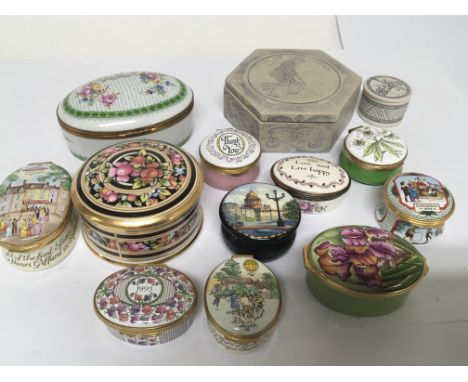 A collection of Halcyon Days Enamel boxes Simular Moorcroft boxes and other modern display boxes,
