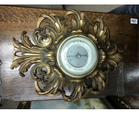 A sunburst barometer.
