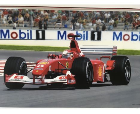 A pair of limited edition Formula One prints, the first being of Michael Schumacher at Magny-Coirs in 2002, limited to 395 pr