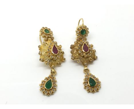 A pair of Indian design 22ct diamond and ruby and emerald earrings. Total weight 15.5g.