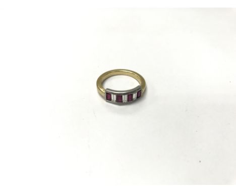 An 18ct gold ruby and diamond ring. Weight approx 4.8g, size approx O