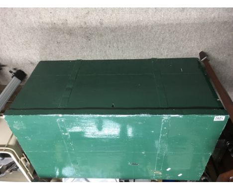 A painted green pine trunk with metal bound top. Approx 53x93x45cm