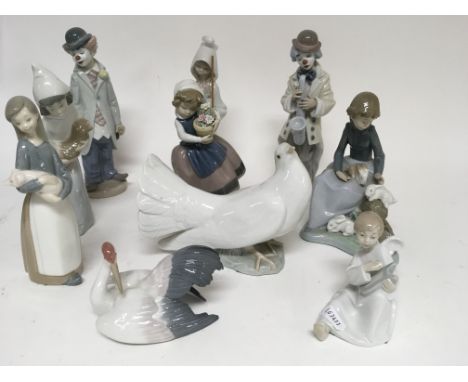 A collection of ten Lladro and NAO figures including a Lladro dove