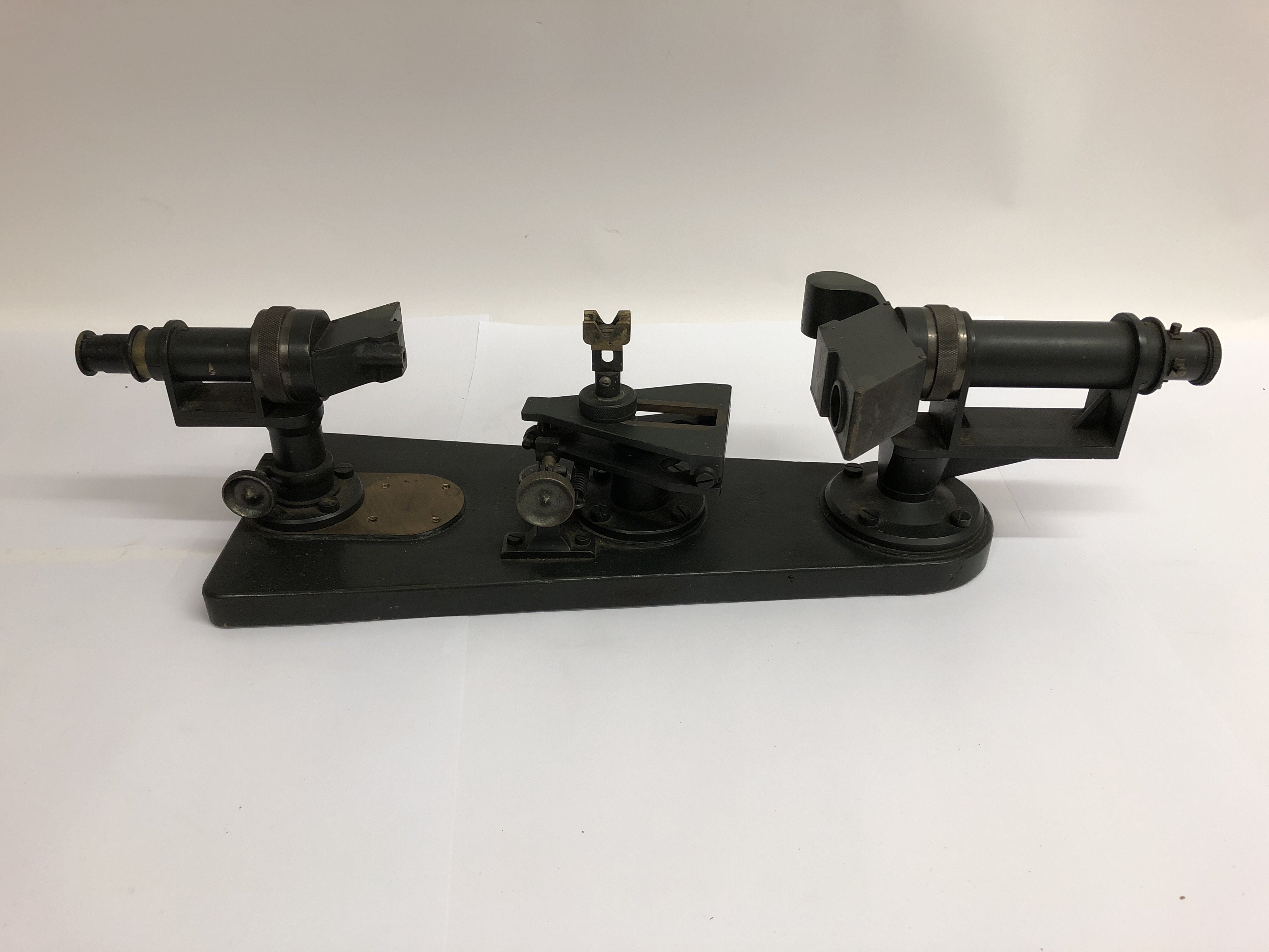A cased WW2 R.101 Binocular Collimator Mk IV gun sight