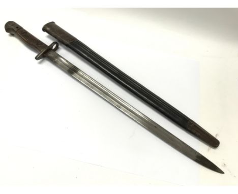 A British Wilkinson bayonet. Total length approx 57.5cm