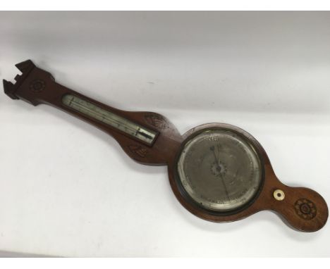 A George III barometer with inlaid shell motifs, approx height 96cm.
