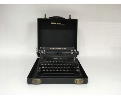 A circa 1940s/1950s cased Remington portable noiseless typewriter, No. 180149
