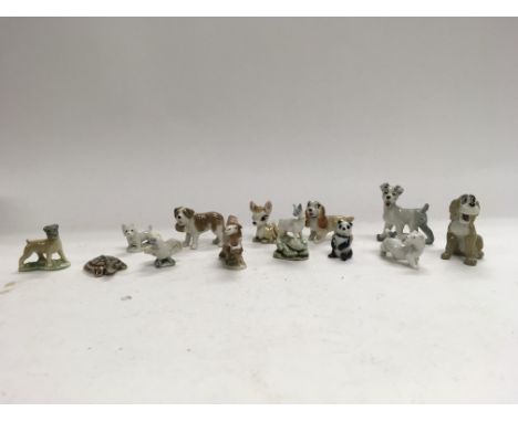 A collection of ceramic whimsies to include some Disney lady & the tramp figures