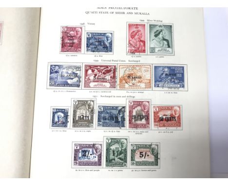 A Stanley Gibbons King George VI stamp album contain8ng an extensive collection of used commonwealth postage stamps including