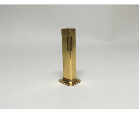A gold plated tallboy Dunhill lighter, in working order
