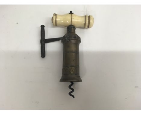 A Vintage ivory handled ratchet type corkscrew