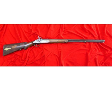A genuine, 19th century percussion cap Tower musket.Muzzle loading black powder type having steel ramrod, solid brass patch b