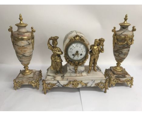 A 19 th century French marble clock set with ormolu mounts, the enamel dial with Arabic numerals flanked by figures 32 cm