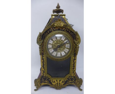 A late 19th / early century French eight day boulle style bracket clock, the elegant case with floral decoration, brass mount