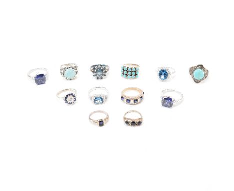 A group of 925 silver &amp; blue stone set rings. The lot to include; square cut stones, dark blue stone, white stone, CZ, tr