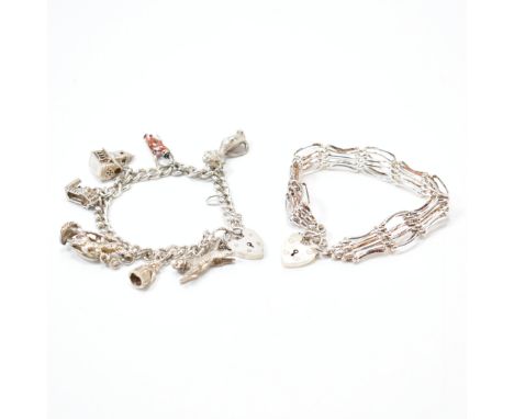 Two silver vintage bracelets. The lot to include a vintage charm bracelet with a curb link chain and seven assorted white met