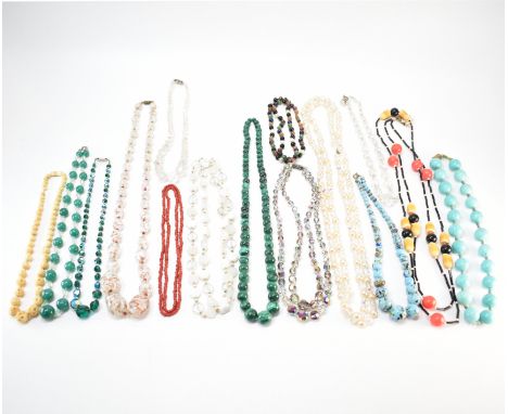 A collection of vintage costume jewellery beaded necklaces. The lot to include ceramic and glass beads, coral necklace, malac