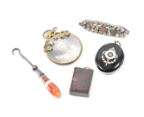 A group of 19th Century Victorian and Edwardian antique jewellery. The lot to include a Victorian silver navette brooch, an a
