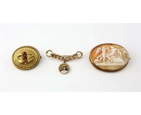 Three brooches, Victorian shell cameo, testing as 15 ct,  gold chain link brooch with round enamel charm of a lady in yellow 