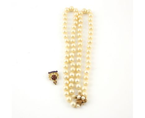 Double row faux pearl necklace, with yellow metal clasp stamped 14 ct set with a round cut sapphire and two pearls and Intell