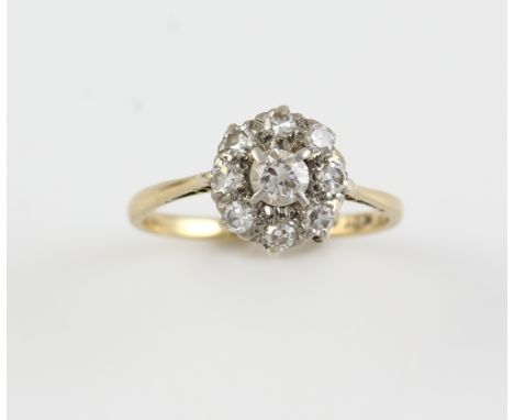 Edwardian diamond daisy ring, central old cut diamond, in surround of Swiss cut diamonds, estimated total diamond weight 0.50