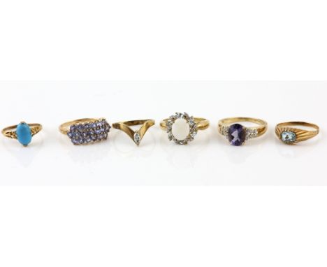 Six gold rings, opal, blue topaz and diamond cluster ring, size T, oval cut blue topaz ring, size P, amethyst and diamond rin