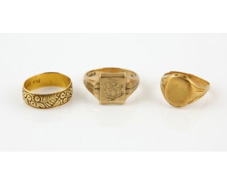 Three rings, late Victorian engraved floral ring, hallmarked Birmingham 1897, oval signet ring, hallmarked Chester 1915, size