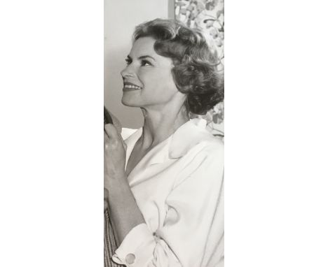 A vintage graduated pearl necklace, white round pearls measuring from 6 to 2mm, strung with knots, to a navette form diamond 