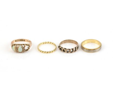 Four gold rings, one vintage two colur gold, in 18 ct, hallmarked 1977, size K, another woven, stamped 12 ct, size K, Edwardi