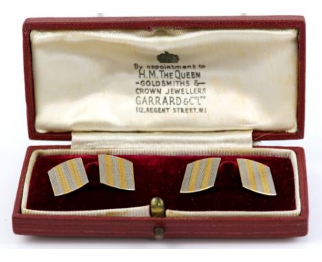 Early 20th C engine turned cufflinks in white and yellow gold stamped 18 ct and platinum, with chain link connection, in fitt