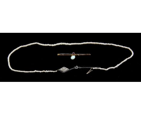 Graduated seed pearl necklace, strung without knots, with chain extension, diamond set clasp stamped 9 ct, measuring approxim