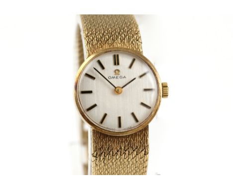  Omega, a Ladies  9 carat gold cased  dress watch,the signed white dial with batons, fitted with a signed 620 calibre 17 jewe