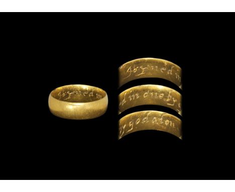 Post Medieval Gold 'Joyned in one by god alon' Posy Ring 18th century AD. A heavy broad barrel-shaped hoop with inscribed tex