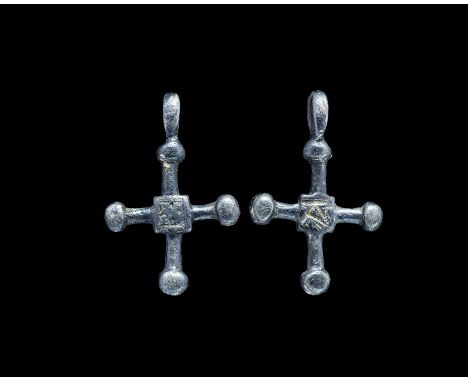 Saxon Silver Cross Pendant 9th-10th century AD. A cast cruciform pendant with thick suspension loop, four short arms each wit