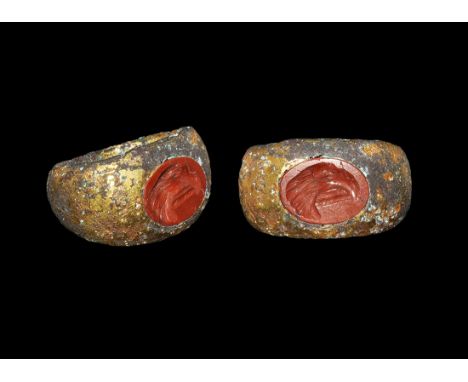 Roman Gilt-Bronze Ring with Jasper Military Eagle Intaglio 2nd century AD. A lentoid-section expanding hoop with inset jasper