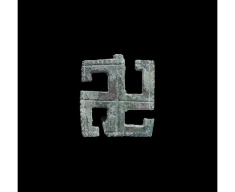 Roman Bronze Decorated 'Swastika' Brooch 2nd-3rd century AD. A flat-section plate brooch of gammadion form with incised lines