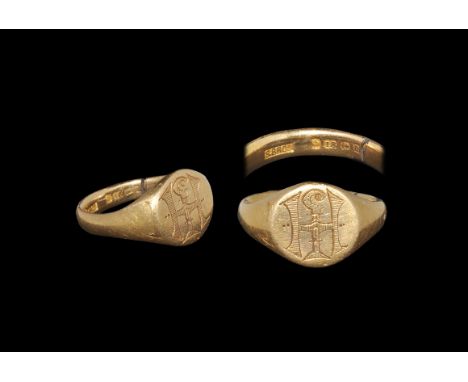 Post Medieval Gold 'Just my Baby' Posy Signet Ring Hallmarked 1912 AD. A barrel-shaped hoop expanding to a discoid plaque wit