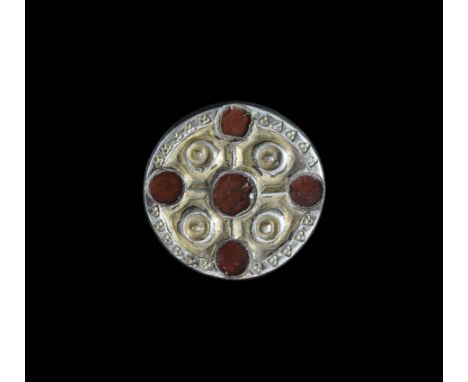 Frankish Silver-Gilt and Garnet Horse Harness Mount 6th century AD. A discoid mount with four stub legs to the reverse; the s
