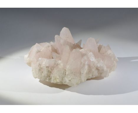 Geological Pink Calcite Mineral Specimen A large unusual specimen of pink calcite (calcium carbonate) comprising a number of 