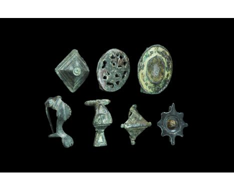 Roman Bronze Brooch Collection 2nd-3rd century AD. A group of seven brooches, all with pins, comprising: a disc brooch with e