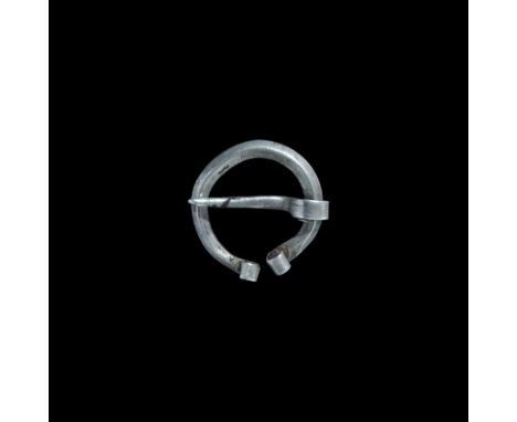 Viking Silver Pennanular Brooch 9th-12th century AD. A small square-section penannular brooch with flattened and scrolled end