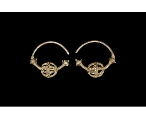 Byzantine Silver-Gilt Temple-Ring Pair 11th-12th century AD. A matched pair of ornaments, each formed as a round-section bar 