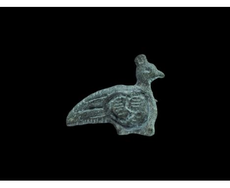Roman Bronze Peacock Brooch 2nd century AD. A flat-section peacock with high-relief wing and tail detail; pin and catchplate 
