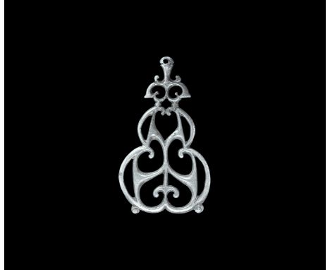 Roman Silver Openwork Mount 3rd century AD. An openwork mount of S-section scrolled bars with palmette and knop finial pierce