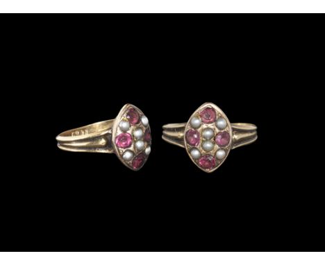 Post Medieval Gold Amethyst and Pearl Ring 19th century AD. A gussetted hoop with flared shoulders, scaphoid plaque with inse