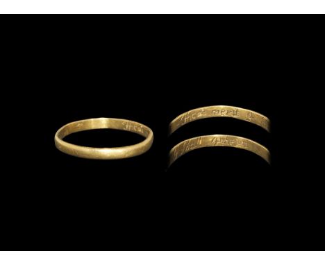 Post Medieval Gold 'If i can merit I shall Inherit' Posy Ring 18th century AD. A narrow flat-section hoop with incised text t